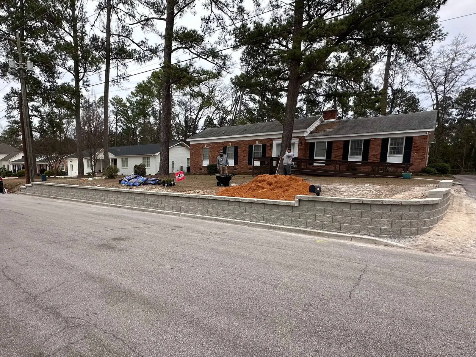 Mulch installation project along commercial property