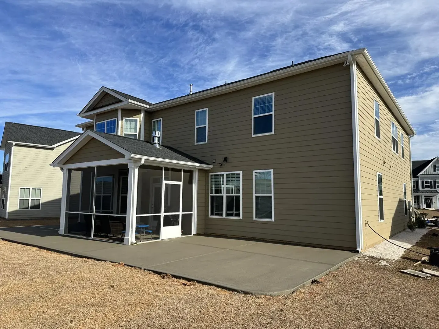 Newly constructed house with bare front yard