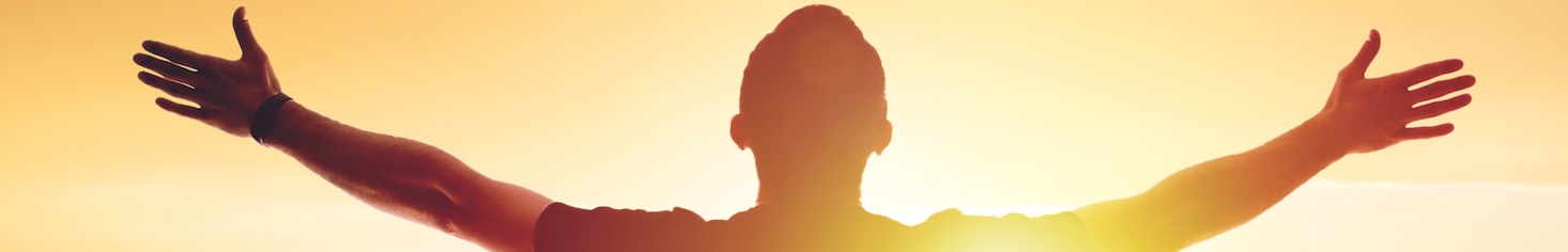 Silhouette of man at sunset, representing satisfaction or trust