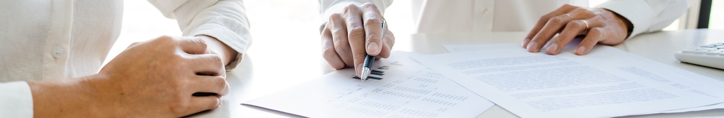 Person signing a landscape service contract