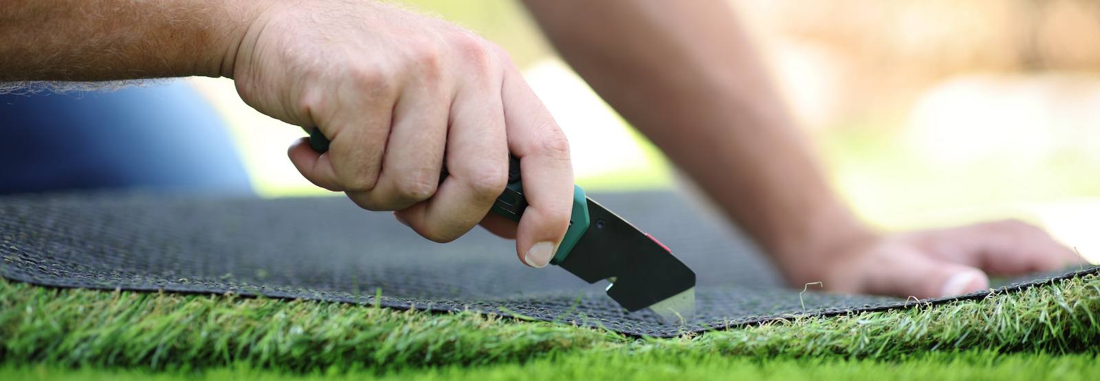Cutting sod edge with trimming tool