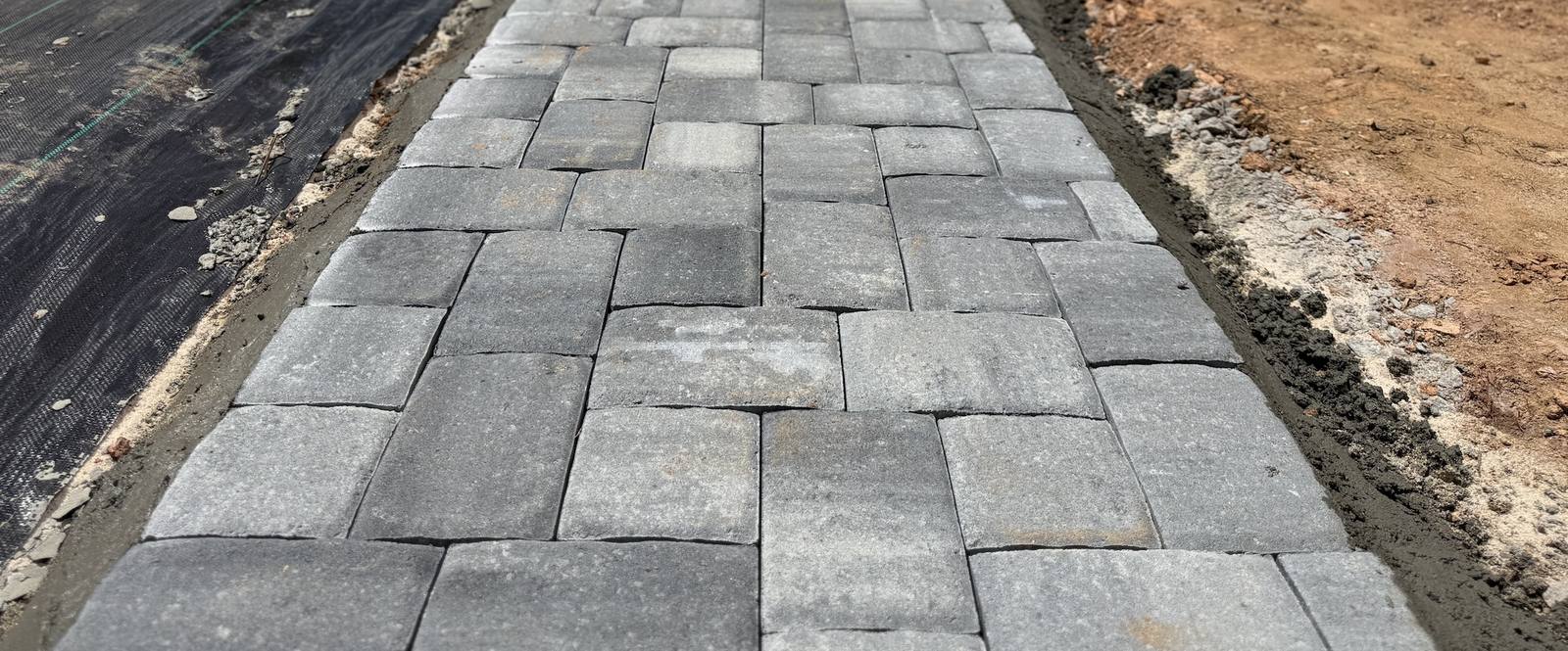 Close-up of newly laid paver walkway
