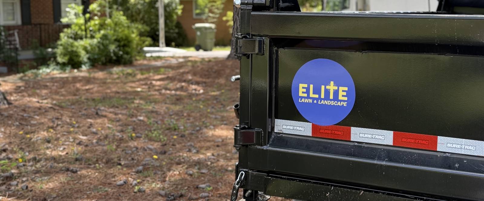 Elite-branded lawn care trailer rear view