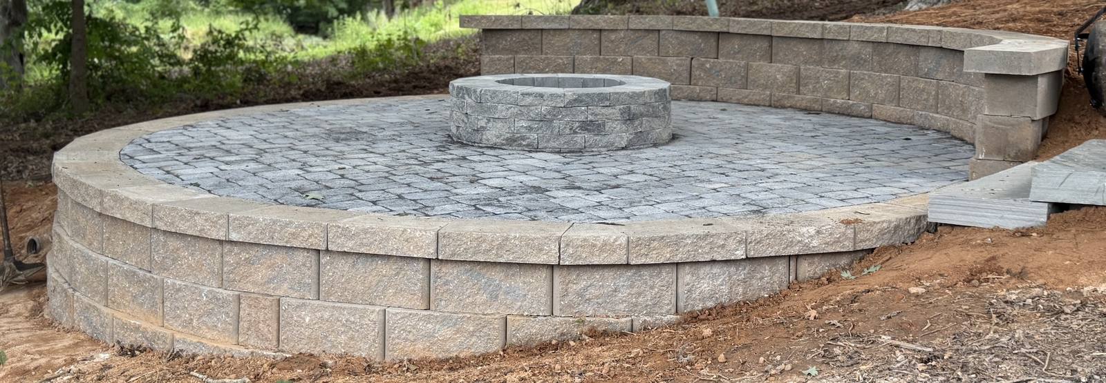 Circular stone patio under construction