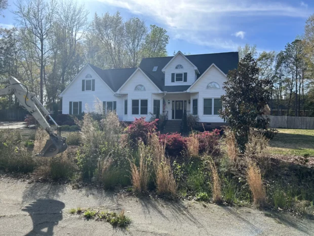 Residential home with ornamental grasses and shrubs